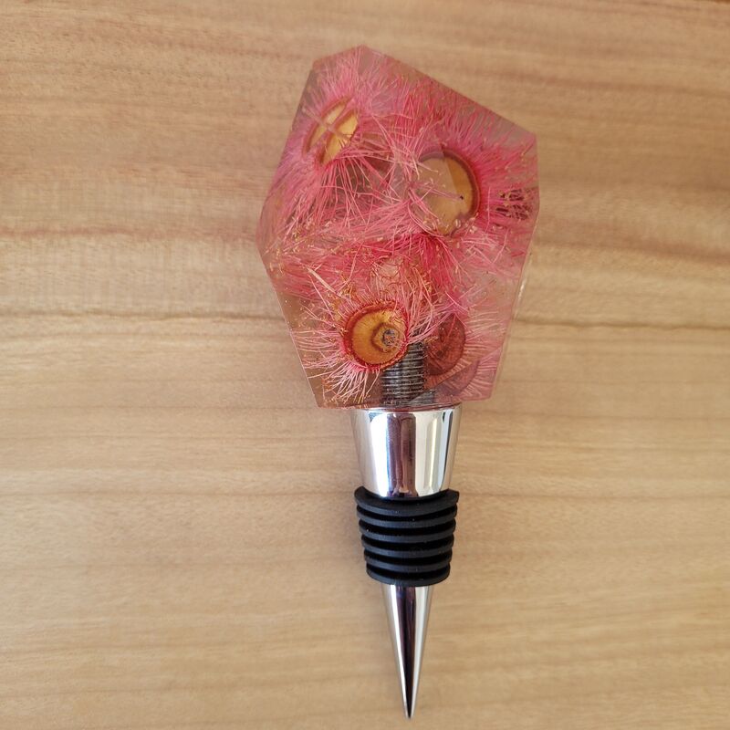 gum flowers in a resin bottle stopper
