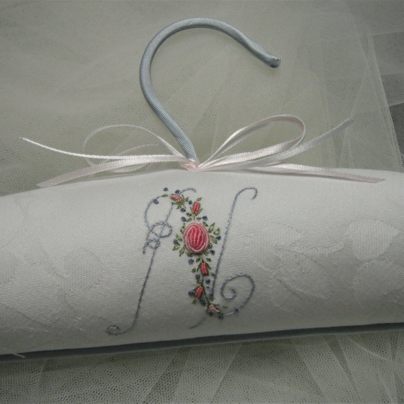 damask white padded coathanger with monogram embroidered initial