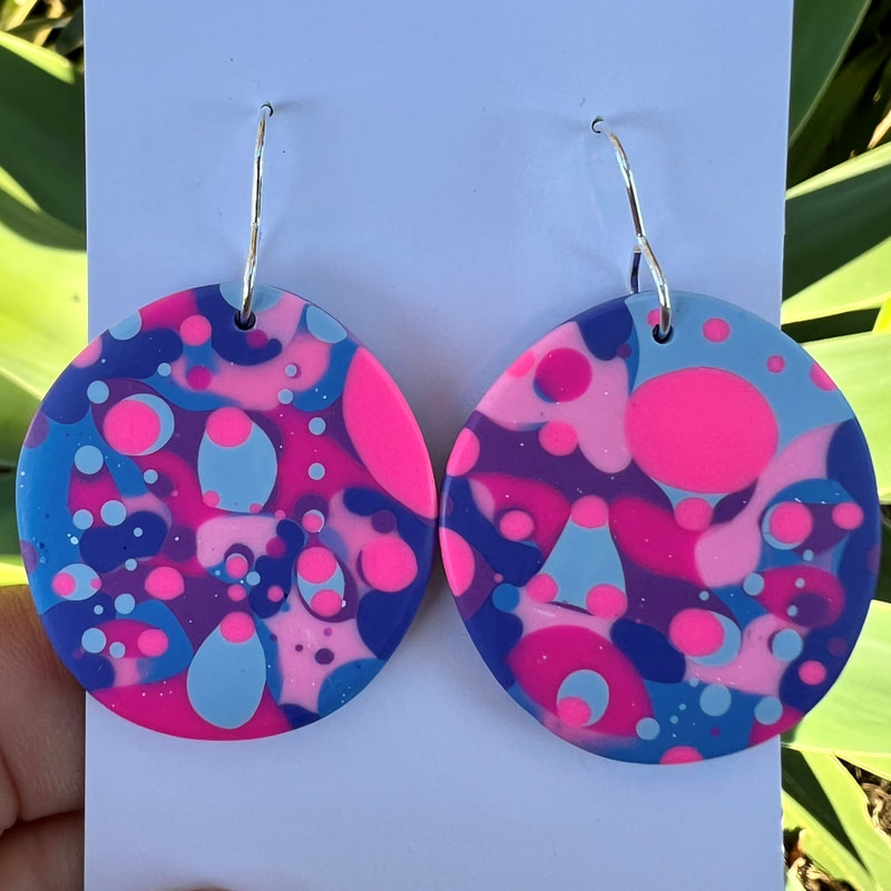 blue and pink polymer circle earrings