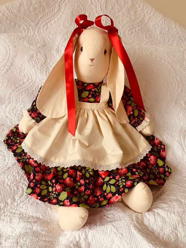 handmade fabric rabbit doll with a dress