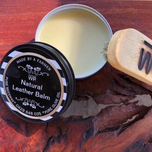 natural handmade leather balm in a tin