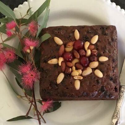 fruit cake with nut decorations