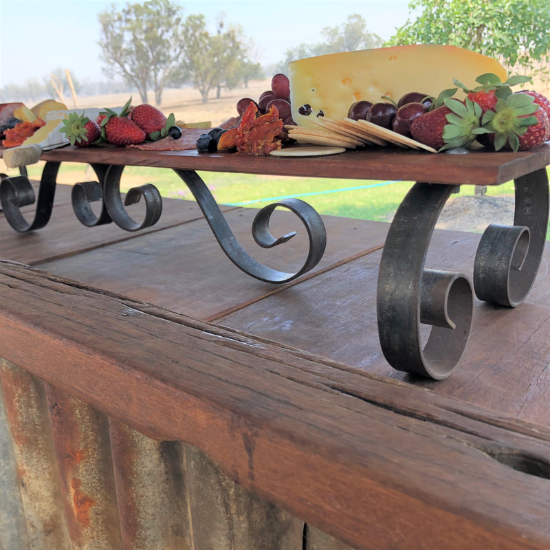 handcrafted metal and wood rustic grazing platter